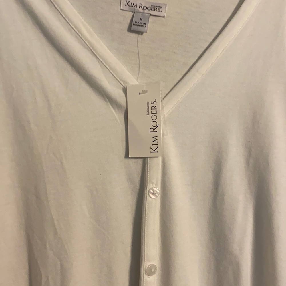 Kim Rogers white long sleeve sweater